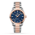 Omega Seamaster Aqua Terra Co-Axial Master Chronometer 38mm dameshorloge met blauwe wijzerplaat en roségouden accenten. Luxe Zwitsers horloge voor dames.